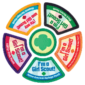 five girl scout heritage patches surrouding a central trefoil patch
