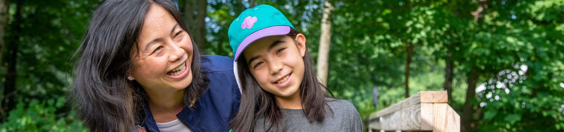  A volunteer and girl outdoors 